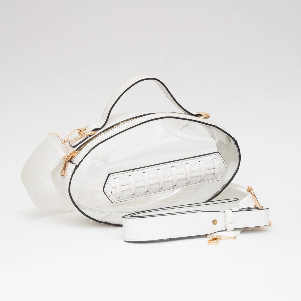 White handbag with gold accents on a light gray background