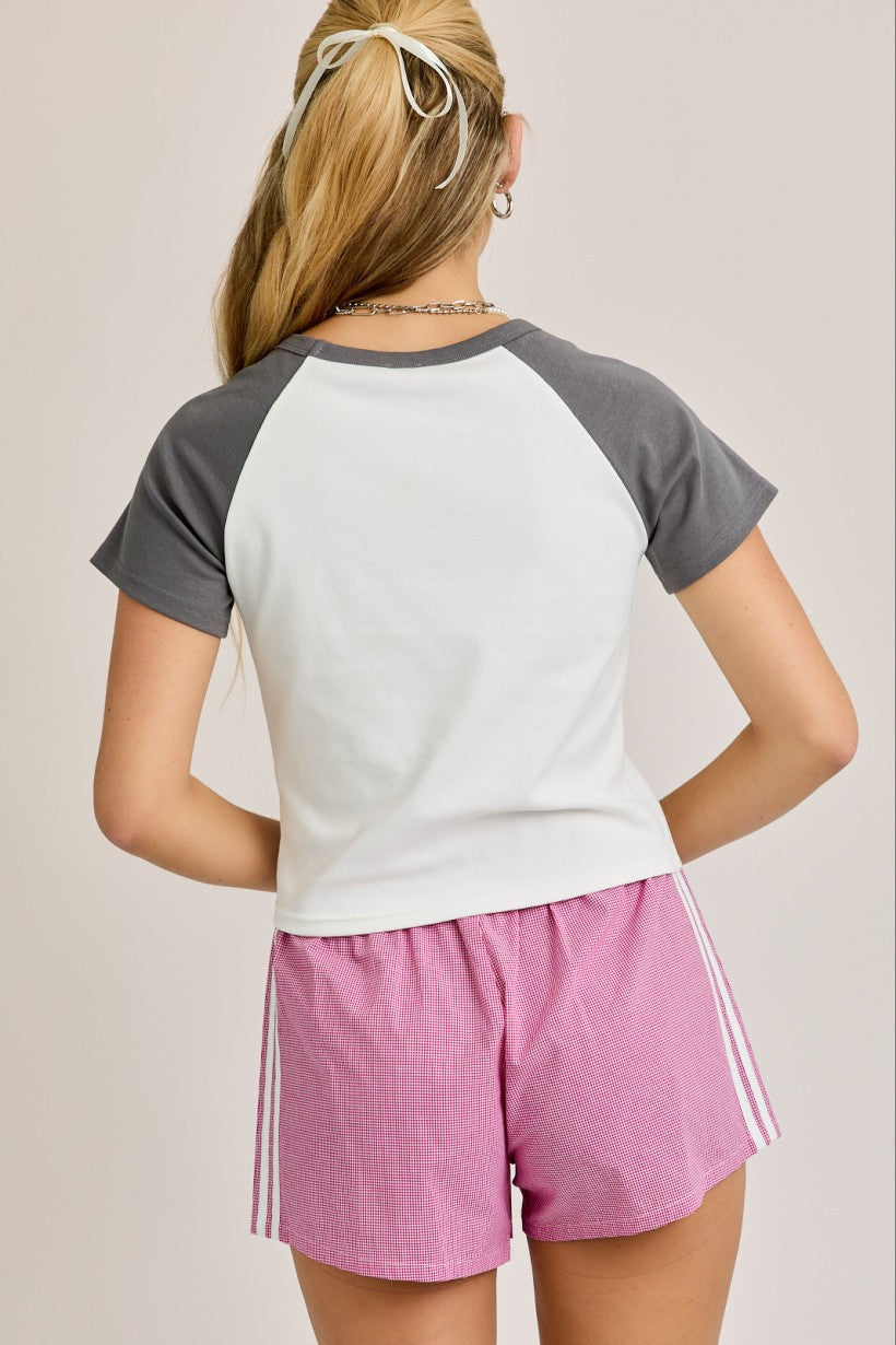 Back of tee shirt, grey sleeves and white body.