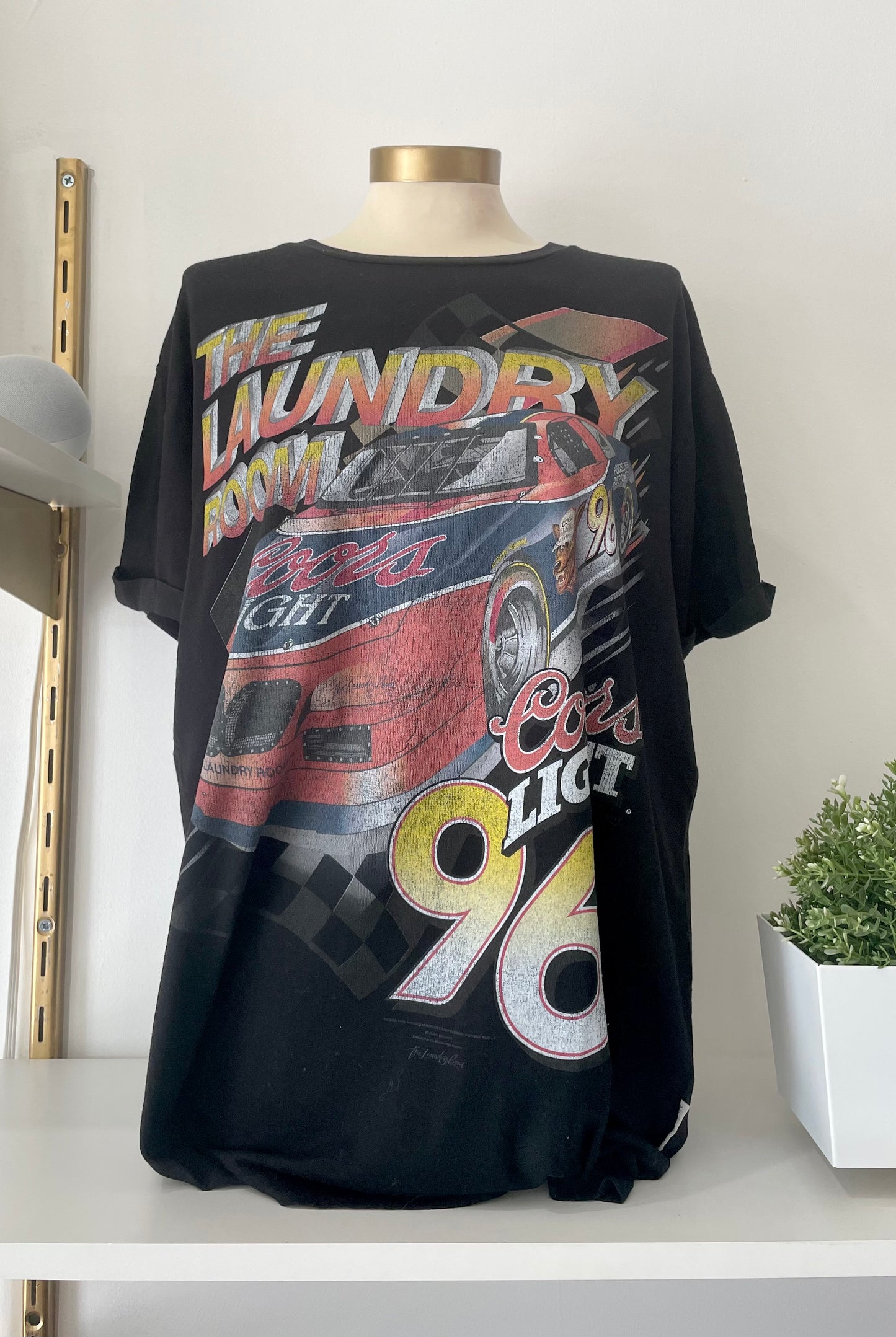 Black oversized graphic racing t-shirt featuring a vintage Coors Light NASCAR design with bold lettering and a race car print.