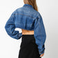 Denim, cropped jean jacket with oversized sleeves.