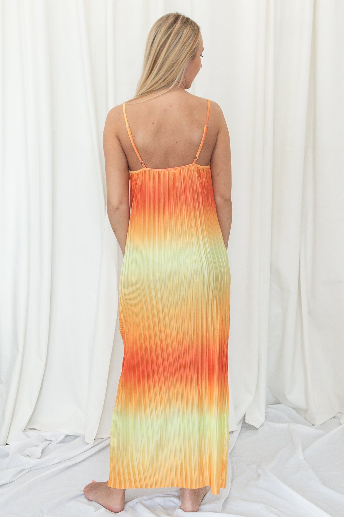 Pleated sunset colored midi dress