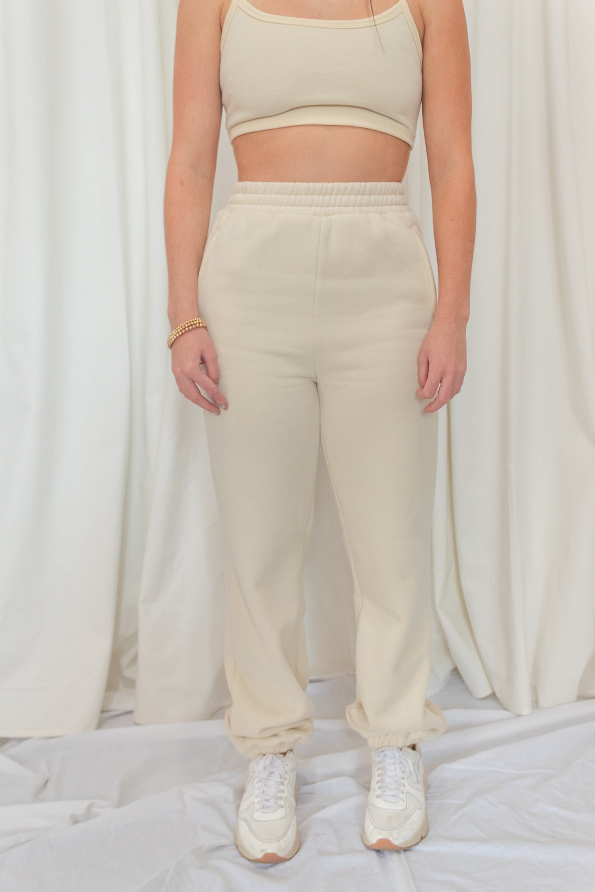 Light beige cropped top and joggers set. 