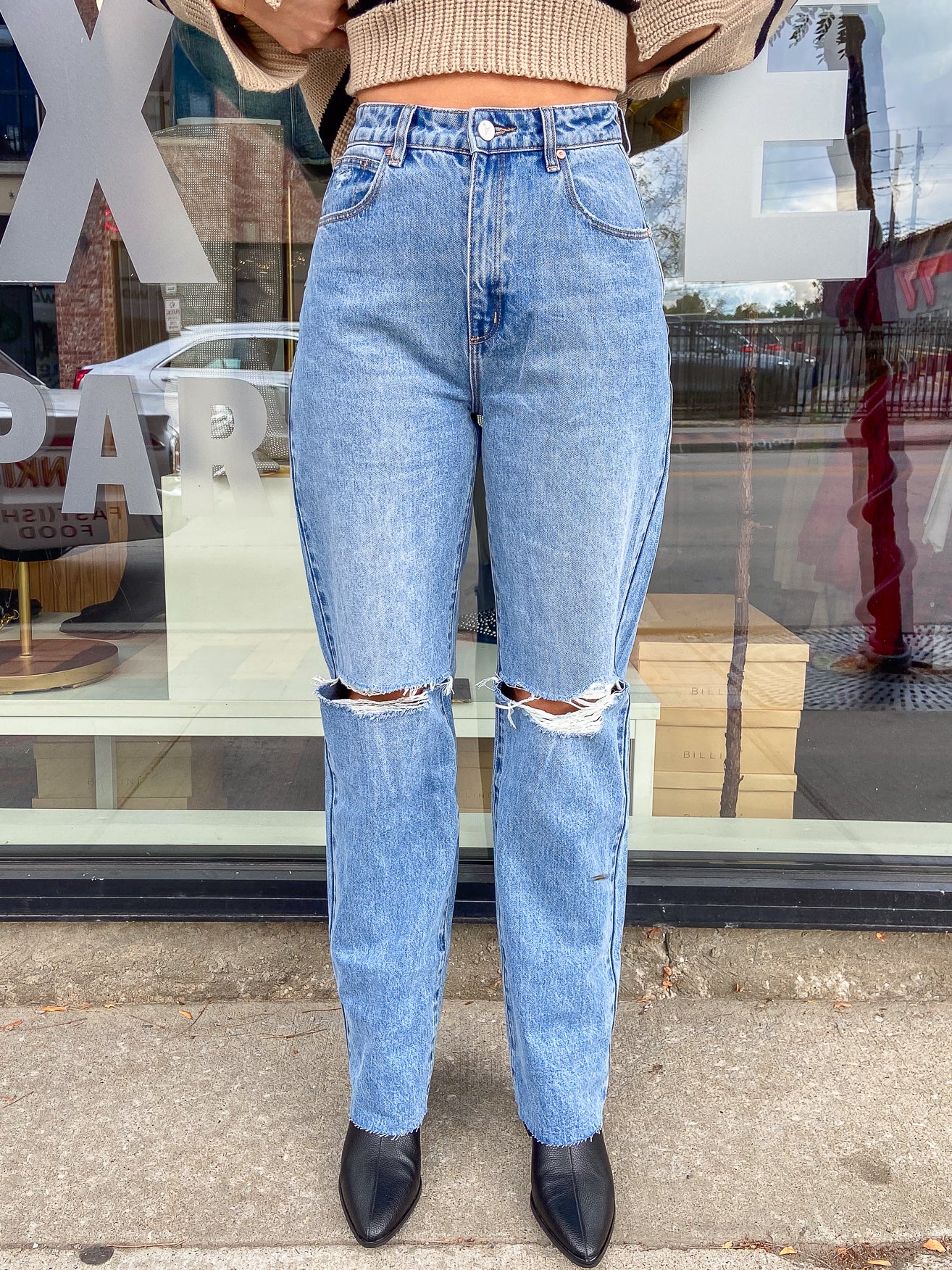 High rise  vintage, mid blue denim Made with 49% recycled cotton Rigid denim is a non-stretch fabric 