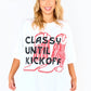 Oversized white t shirt with "classy until kickoff" on the front