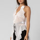 White sheer mesh halter neck top with a rosette, top ties in the front and features long ruffles.
