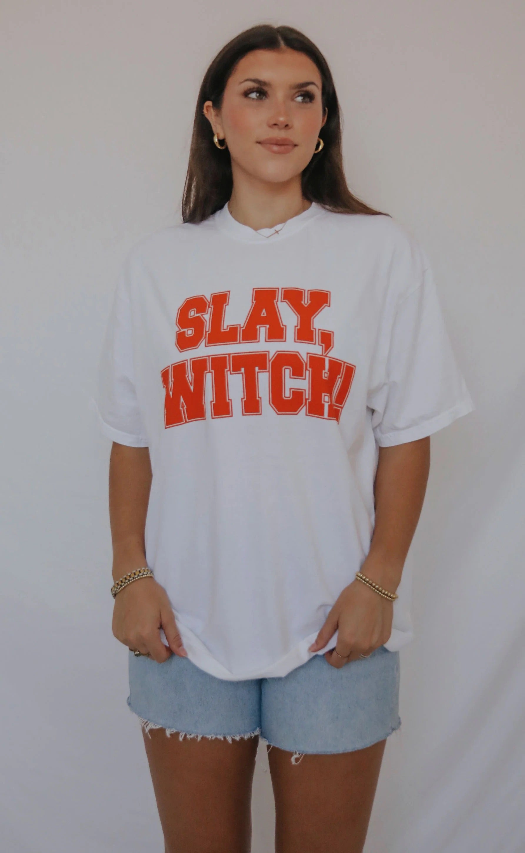 White t-shirt with slay witch in orange