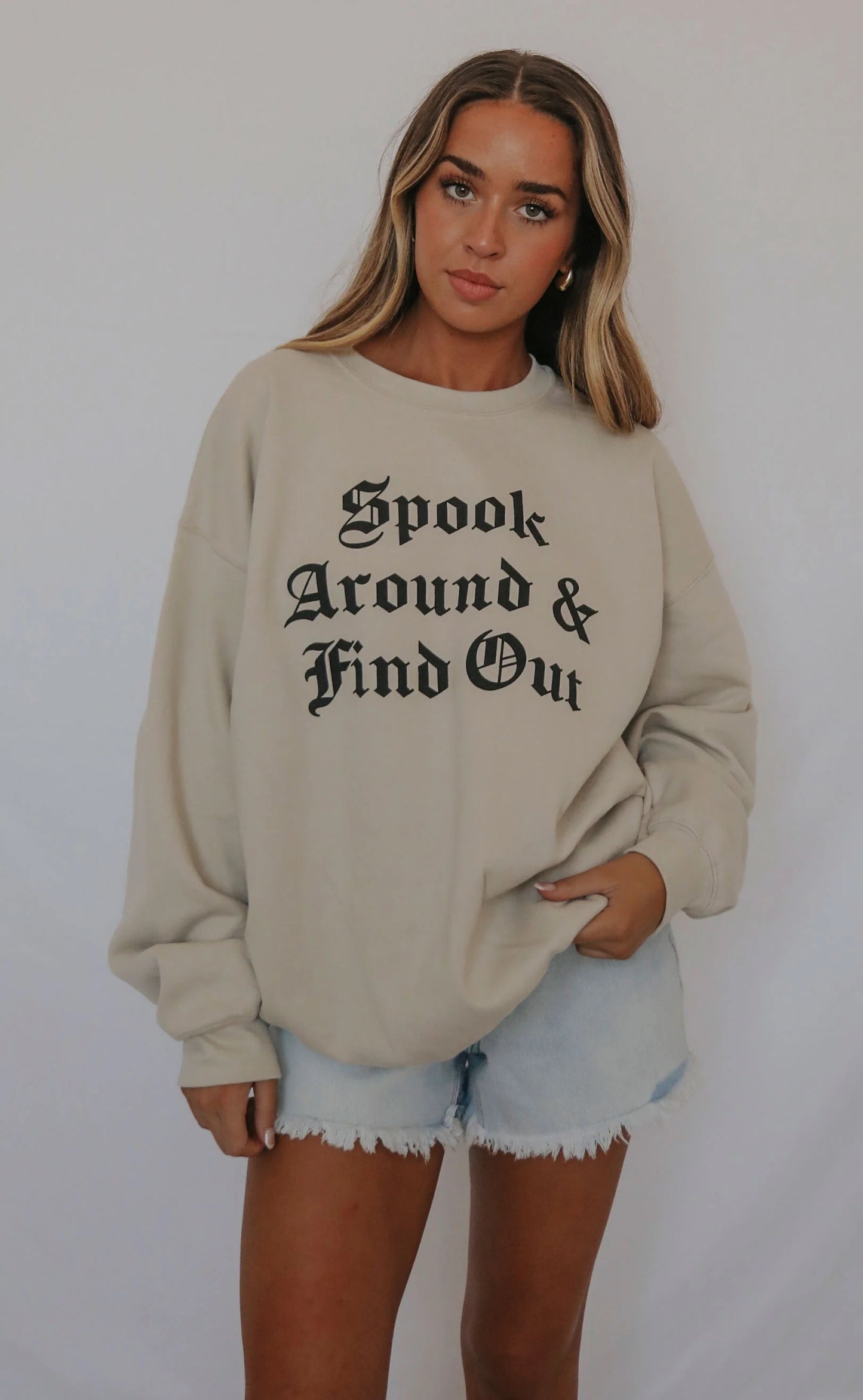 Tan Sweatshirt With Spook Around & Find Out On Front