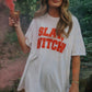 White t-shirt with slay witch in orange